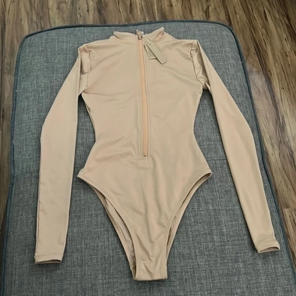 SKIMS swim zip